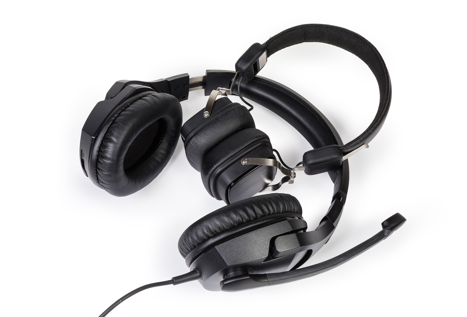 Wired high-fidelity headset with full size headphones and wireless ear speakers on a white background