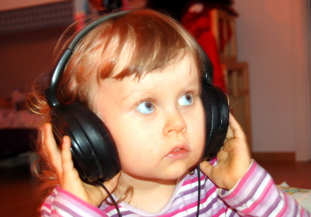 toddler wearing headphones